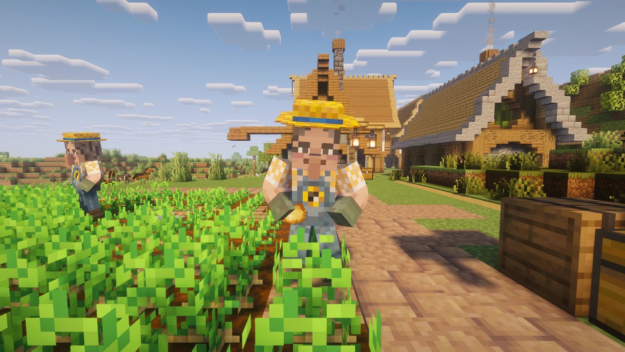 A farmer harvesting crops in the village fields